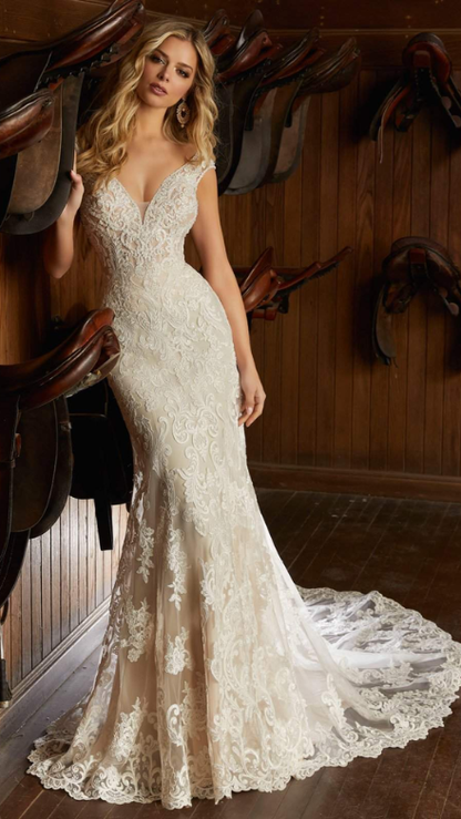 Beaded lace wedding gown